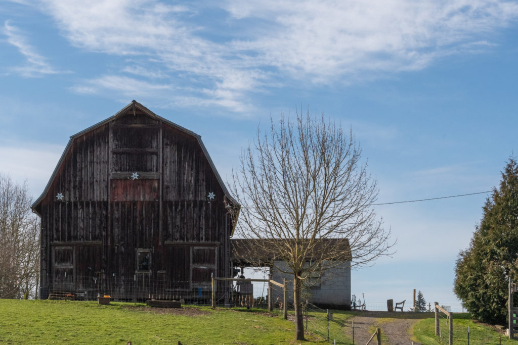 Barn on a hillside.